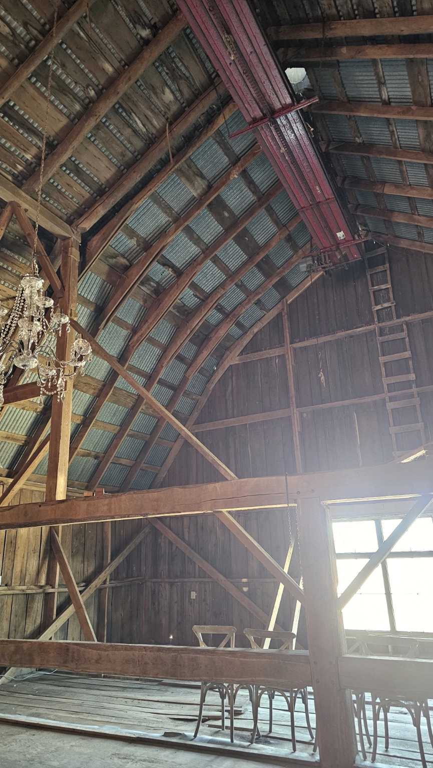 Daylight through the barn windows onto the upper rafters